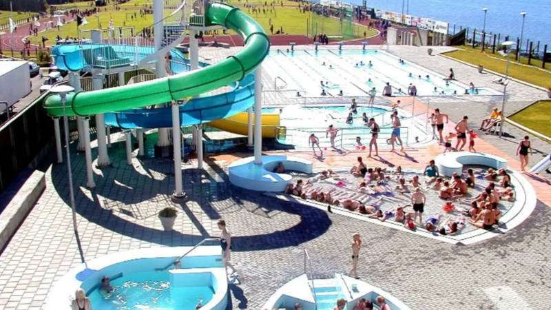 Crowded Borgarnes Swimming Pool on a sunny day