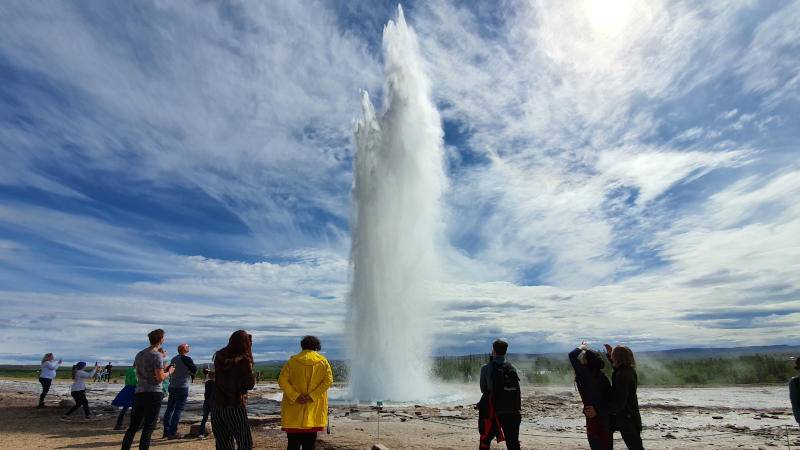 Icelandic gaysir erupting on a sunny day