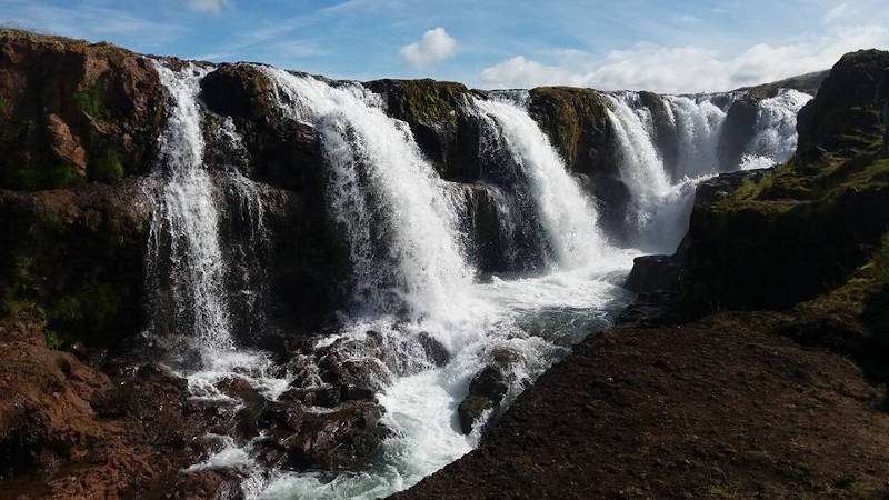 Kolugljúfur waterfalls on a sunny day