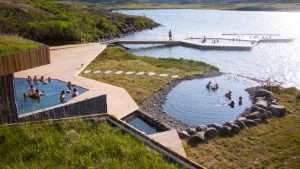 Scenic VOK Baths Iceland on a lake on a sunny day