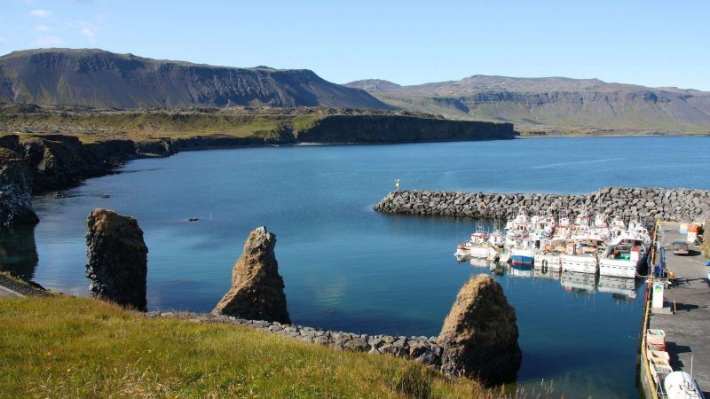 Arnarstapi harbour on a sunny day, aerial view
