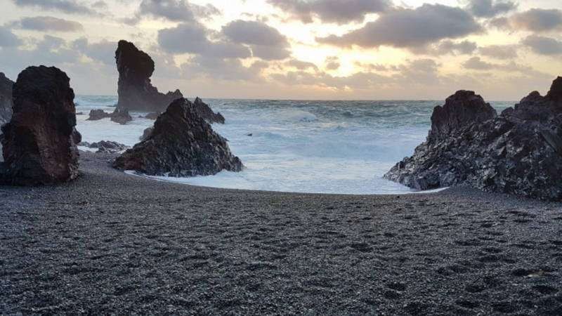 Djúpalónssandur at sunset with rough ocean