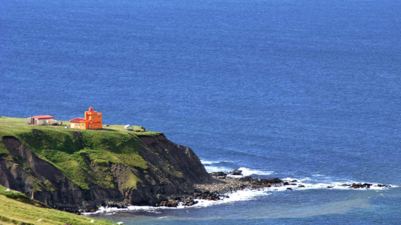 Orange lighthouse on Trollaskagi