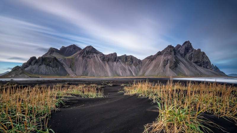 Vestrahorn with black dunes and green grass