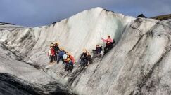 Glacier hike on a sunny day, group photo with people