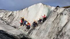 Glacier hike on a sunny day, group photo with people